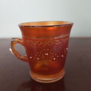 Antique Fenton Art Glass 'Orange Tree' pattern amberina carnival glass mug